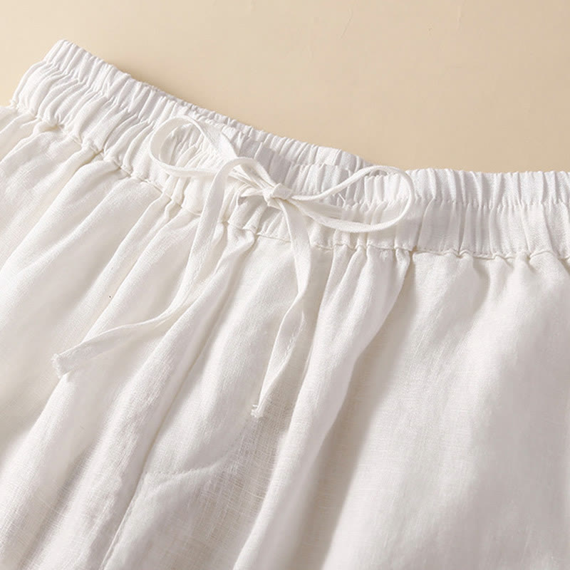 Relaxed Drawstring Shorts with Elegant Lace-Trimmed Hem