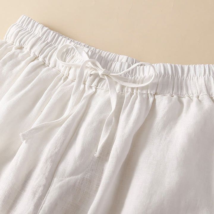 Relaxed Drawstring Shorts with Elegant Lace-Trimmed Hem