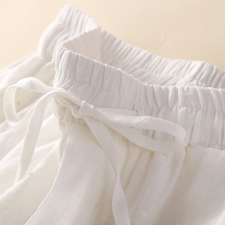 Relaxed Drawstring Shorts with Elegant Lace-Trimmed Hem