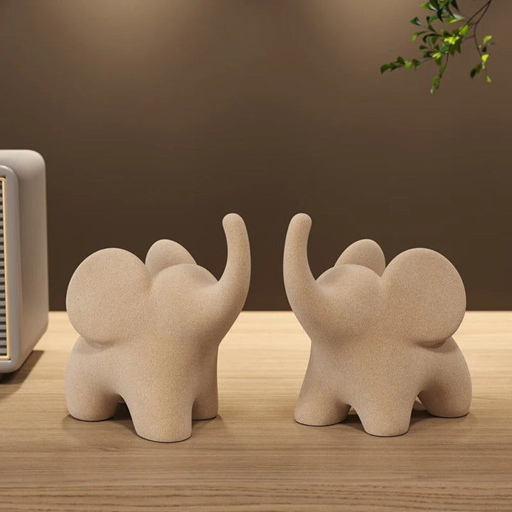 Modern Resin Elephant Figurine With Uplifted Trunk