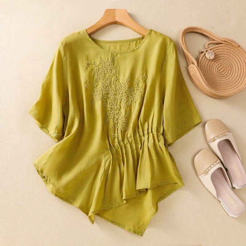 Relaxed Embroidered Blouse with Asymmetrical Hem and Soft Pleated Detail