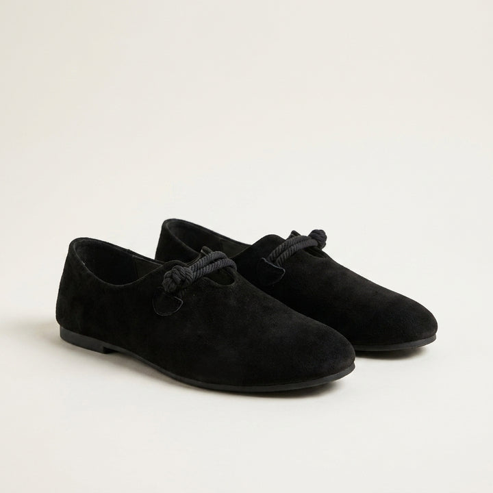 Minimalist Slip-On Flats with Rounded Toe and Braided Strap Detail