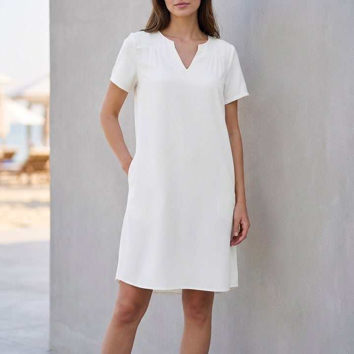 Relaxed V Neck Mini Dress with Rolled Sleeves and Curved Hem